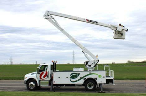 Bucket truck accessing hard to reach surfaces