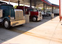 Big rigs refuel at a major truck stop